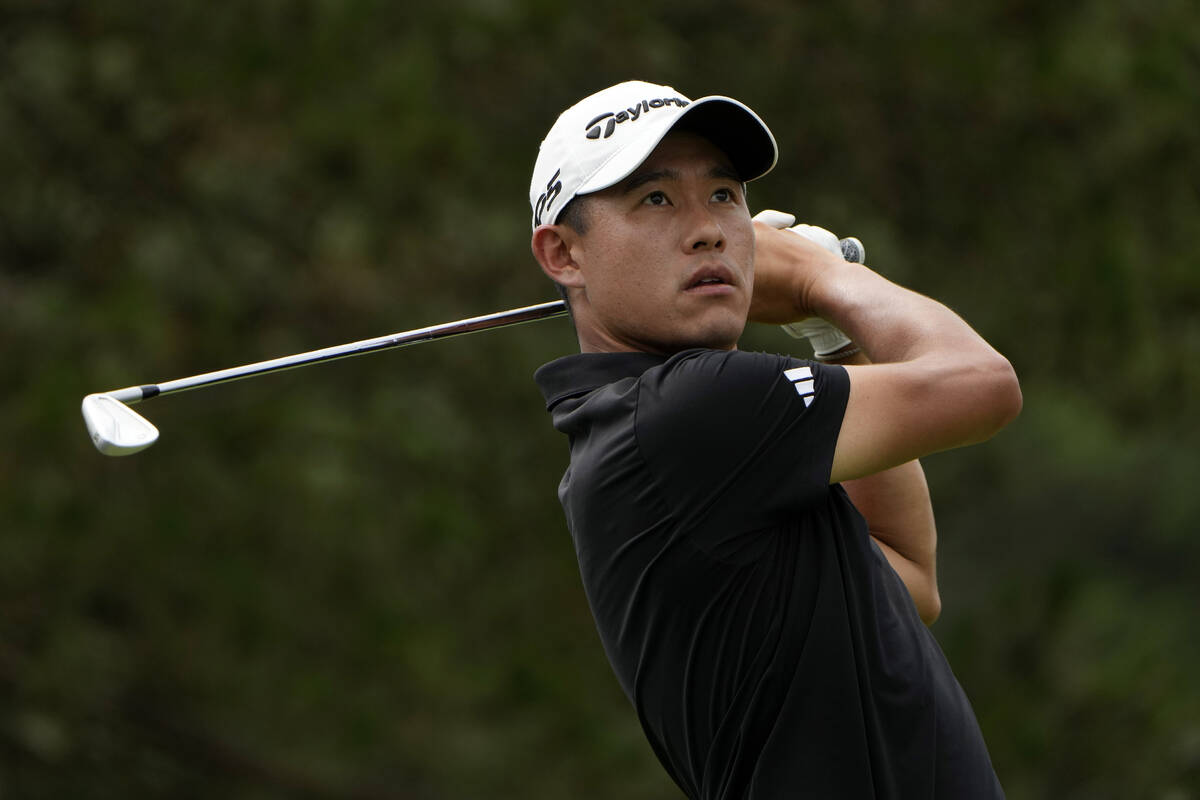 Collin Morikawa tees off on the fifth hole during the final round of the Travelers Championship ...