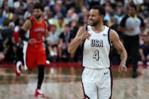 USA guard Stephen Curry (4) reacts after scoring during the second half of a showcase basketbal ...