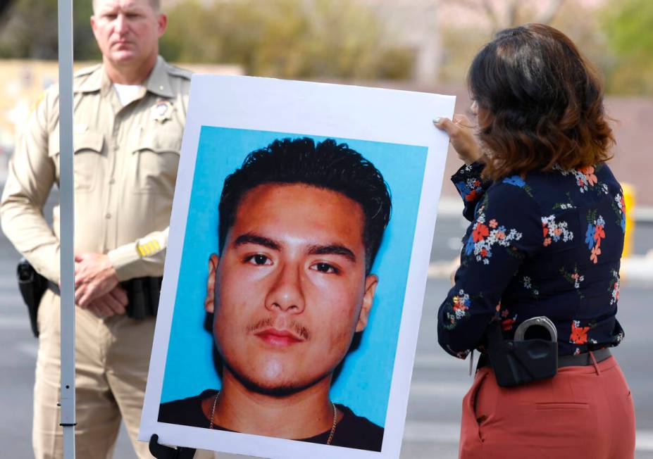 A photograph of Luis Angel Equihua-Murillo, the suspect in hit-and-run crash, is displayed duri ...