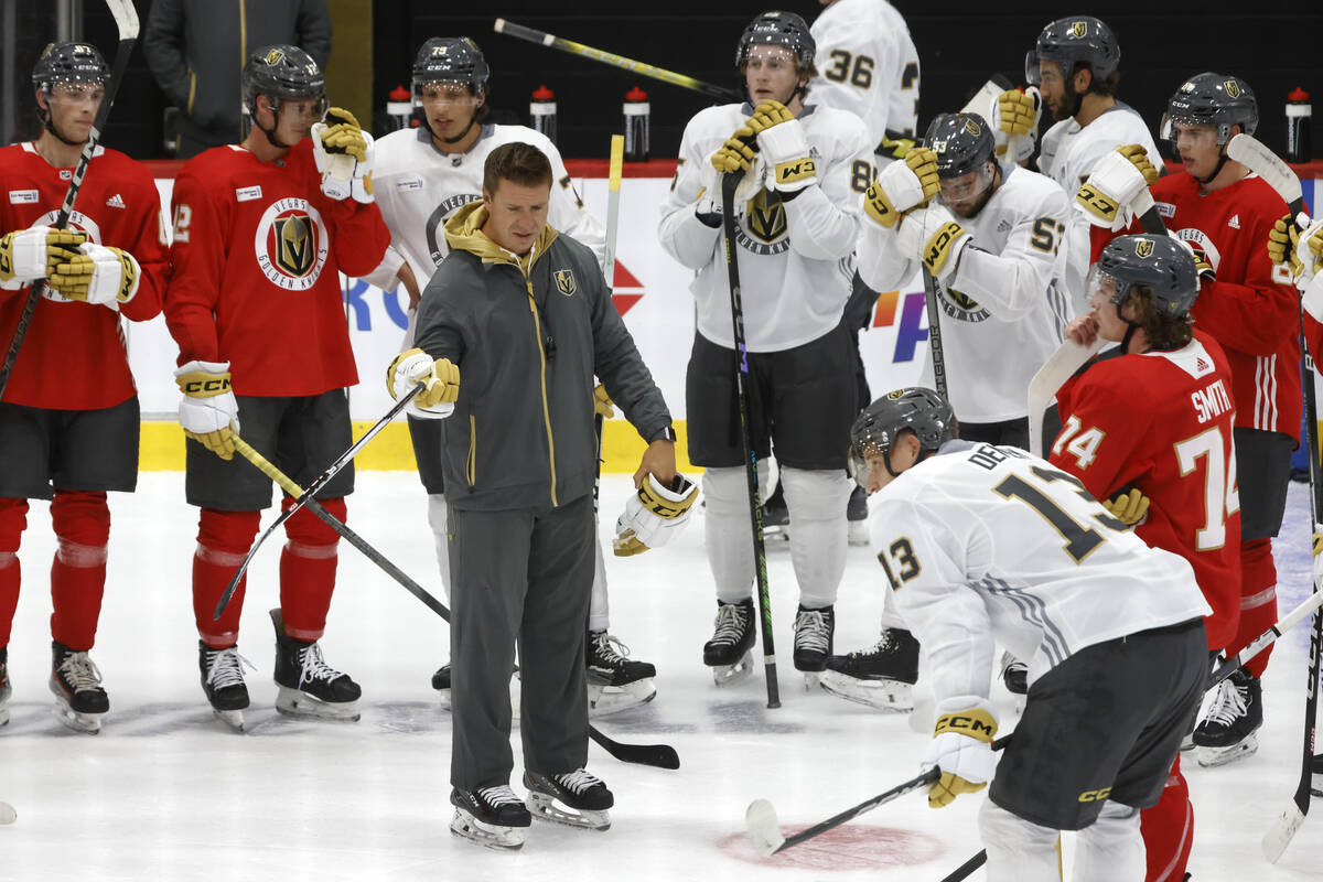 Silver Knights head coach Ryan Craig speaks to players during Golden Knights development camp ...