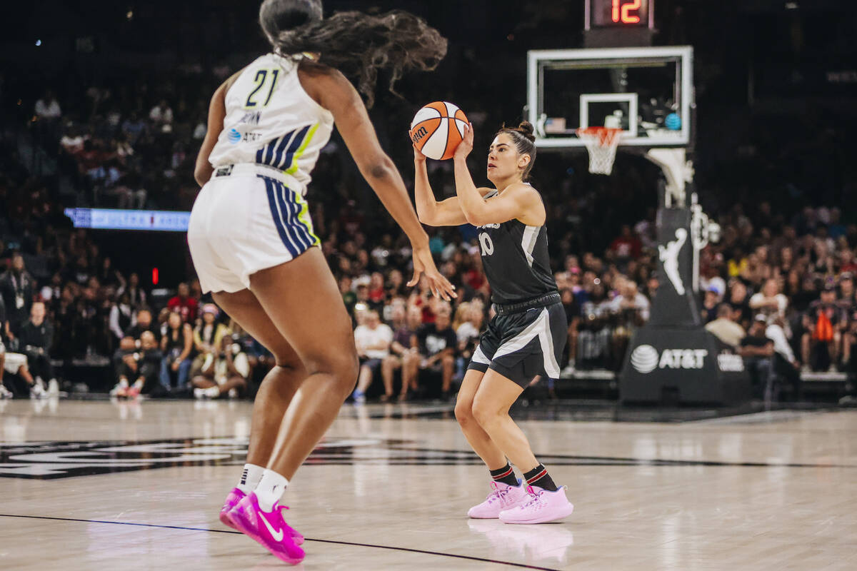 Aces guard Kelsey Plum (10) attempts a basket during a WNBA basketball game between the Aces an ...