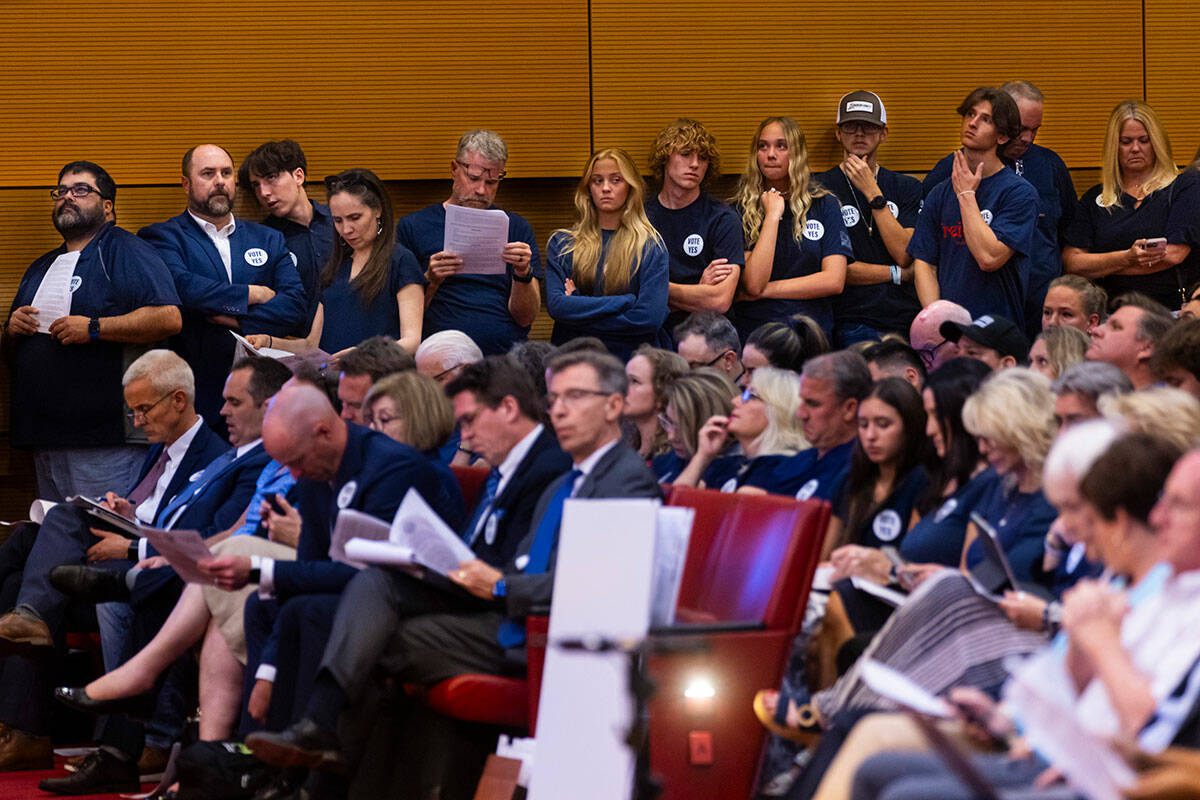 Supporters, in blue, of a proposed new The Church of Jesus Christ of Latter-day Saints temple a ...