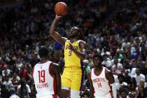 Los Angeles Lakers guard Bronny James Jr. (9) shoots against Houston Rockets forward Nate Willi ...