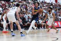 Denver Nuggets guard Julian Strawther drives toward the hoop against the LA Clippers during a N ...