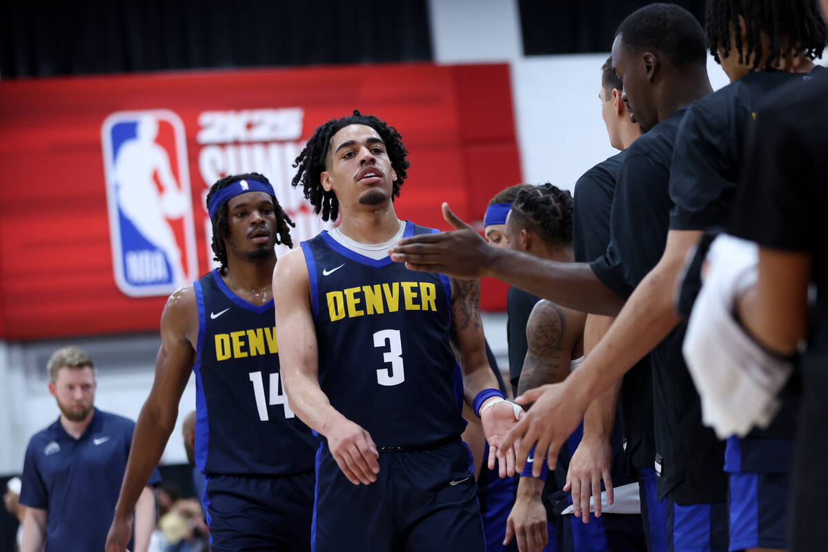 Denver Nuggets guard Julian Strawther (3) is welcomed to the bench during a NBA summer league b ...