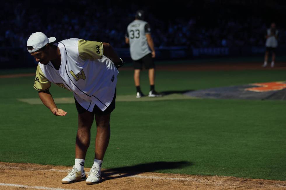 Golden Knights defenseman Keegan Kolesar bows after hitting a home run during the annual Battle ...