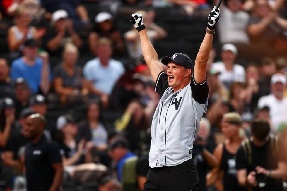 Raiders kicker Daniel Carlson celebrates after scoring during the annual Battle for Vegas chari ...