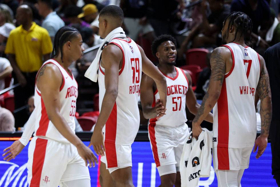 The Houston Rockets react after winning an NBA summer league basketball game against the Los An ...
