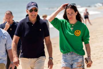 President Joe Biden walks on the beach with daughter Ashley Biden. (AP Photo/Manuel Balce Cenet ...