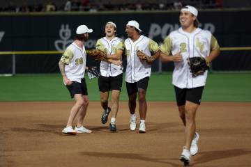 The Golden Knights celebrate after their Brendan Brisson ended an inning during the annual Batt ...