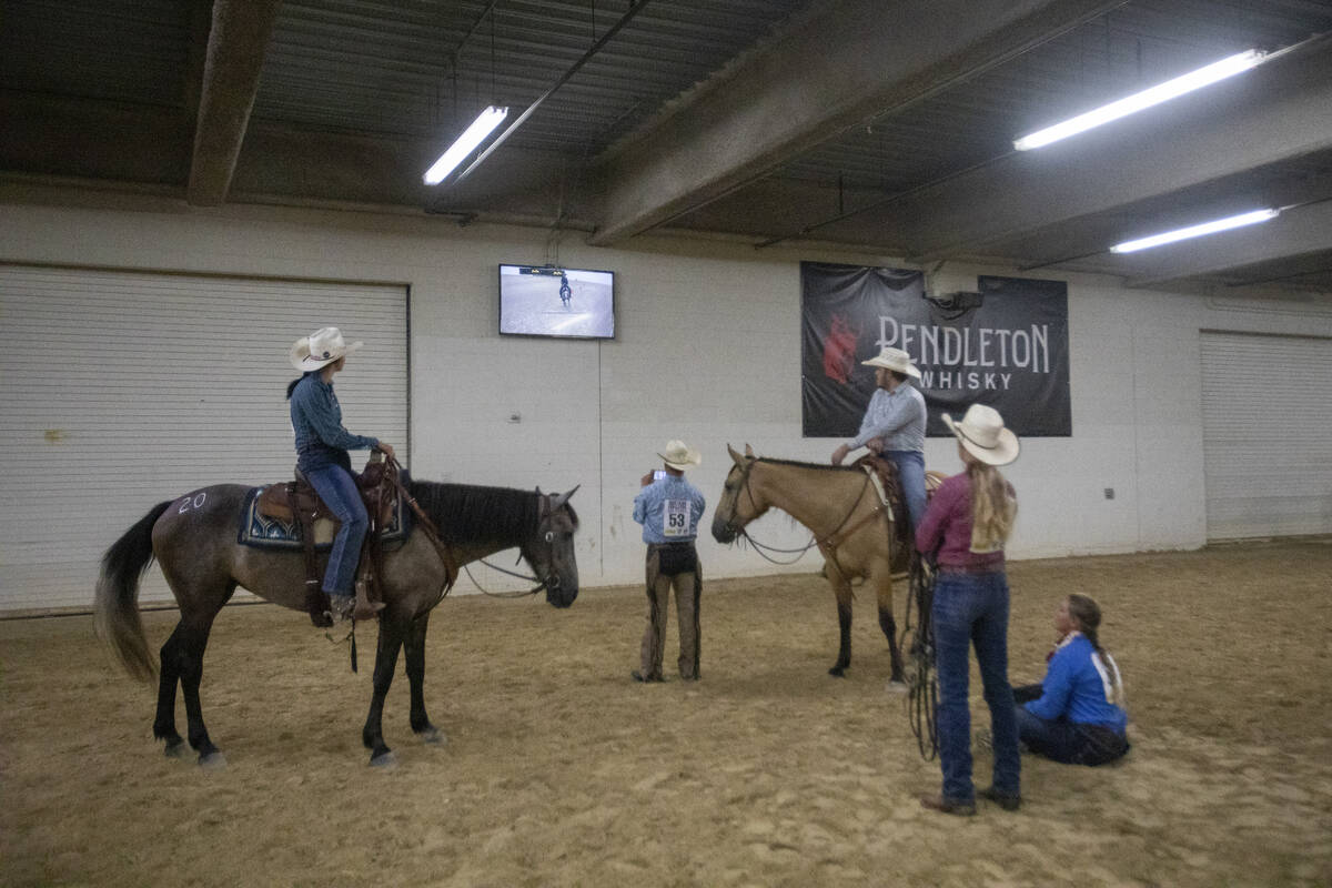Competitors warm-up and watch a broadcast of the competition during the Mustang Challenge at So ...