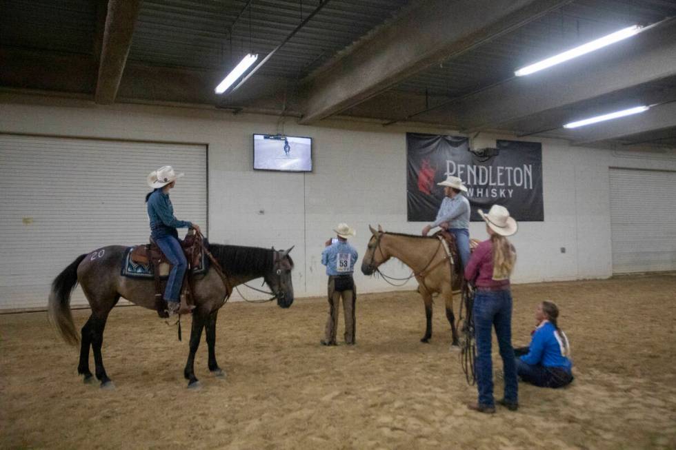 Competitors warm-up and watch a broadcast of the competition during the Mustang Challenge at So ...