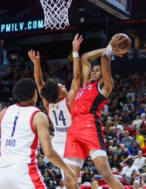 Houston Rockets center Orlando Robinson (59) fights for a basket during an NBA Summer League ga ...