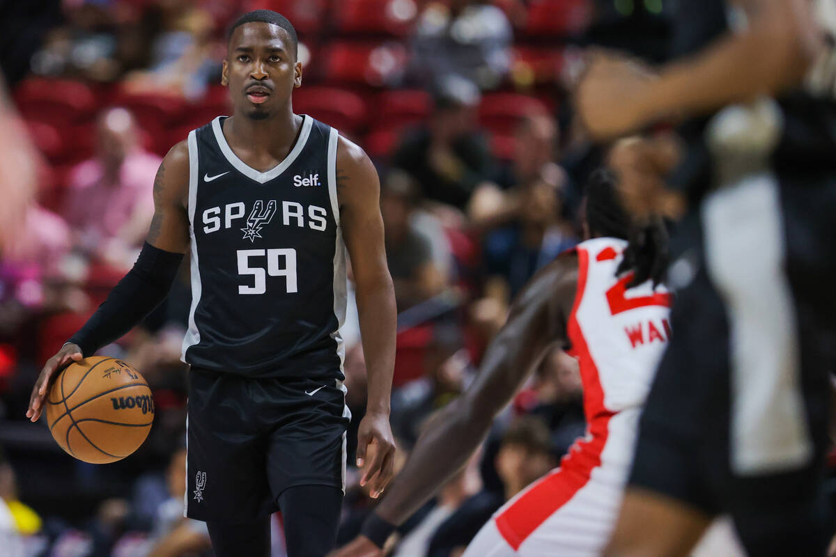 San Antonio Spurs guard D’Moi Hodge dribbles the bal during an NBA Summer League game be ...