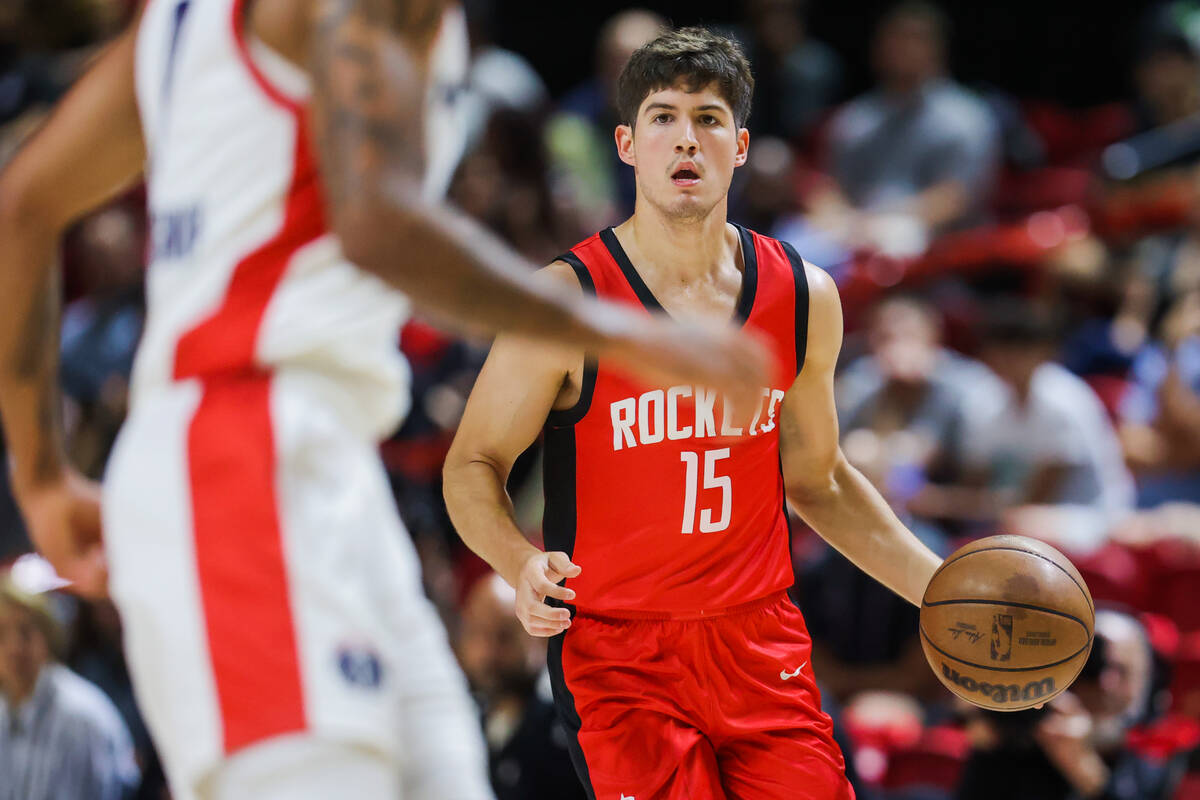 Houston Rockets guard Reed Sheppard (15) dribbles the ball during an NBA Summer League game bet ...