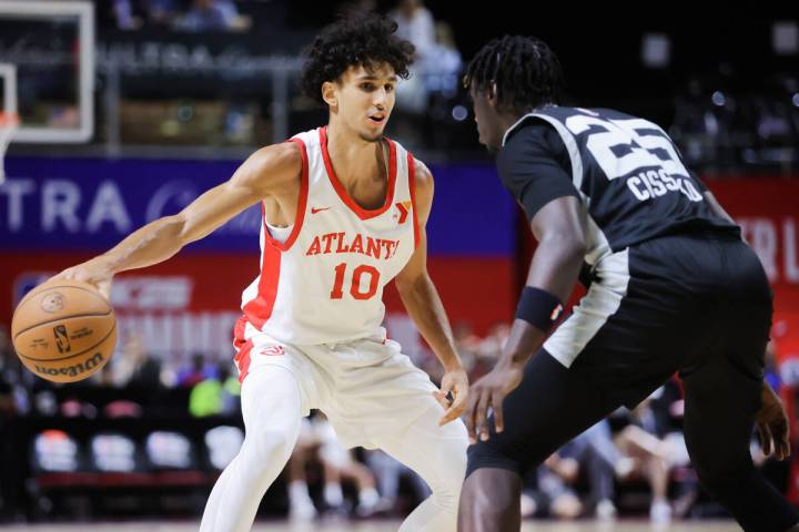 Atlanta Hawks forward Zaccharie Risacher (10) dribbles the ball during an NBA Summer League gam ...