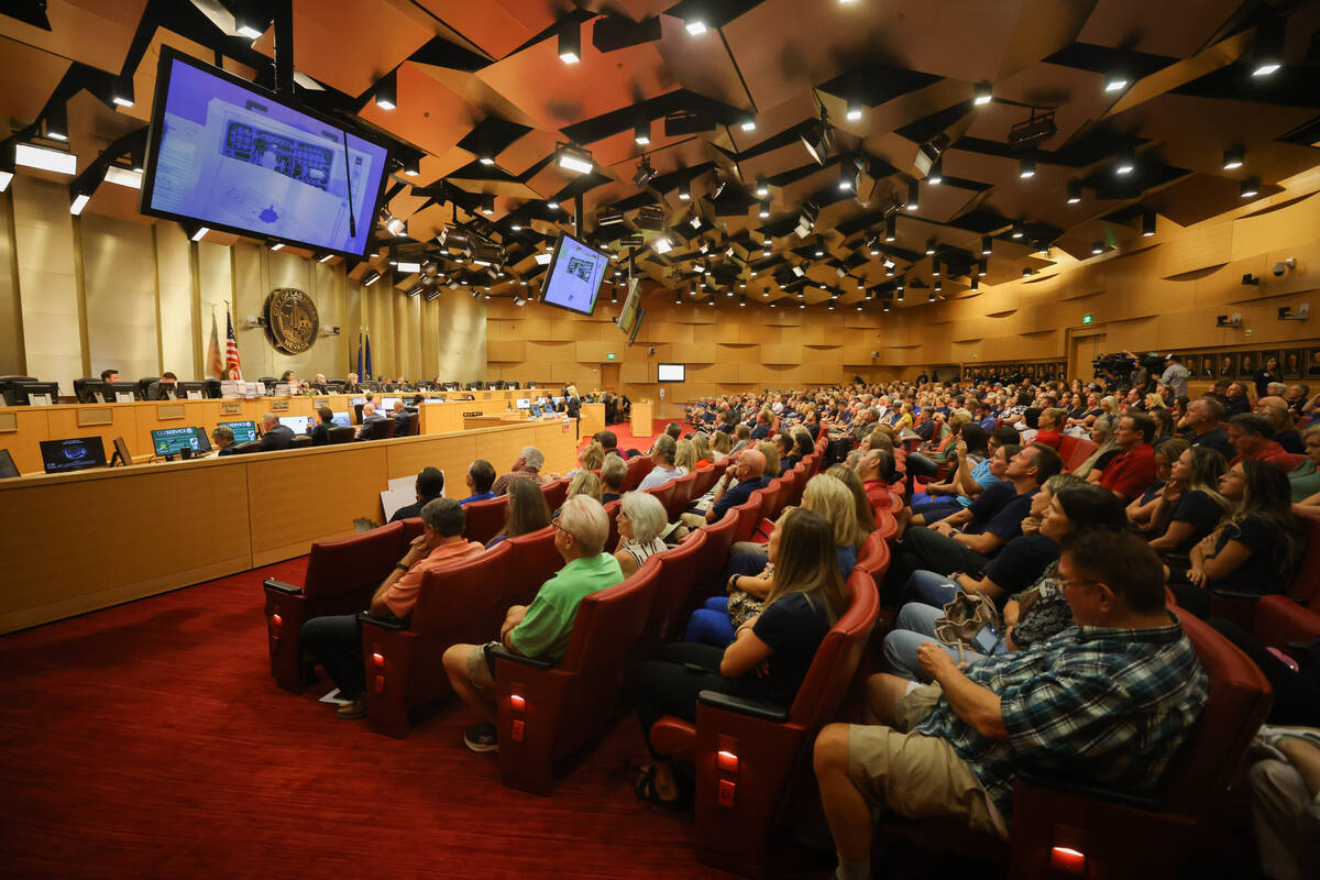 Las Vegas residents sit in on a city council meeting for a new Church of Jesus Christ of Latter ...