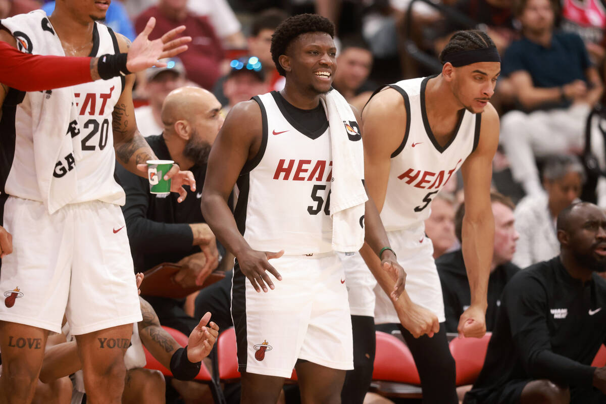 Miami Heat guard Isaiah Stevens (50) cheers his team against Oklahoma City during an NBA Summer ...