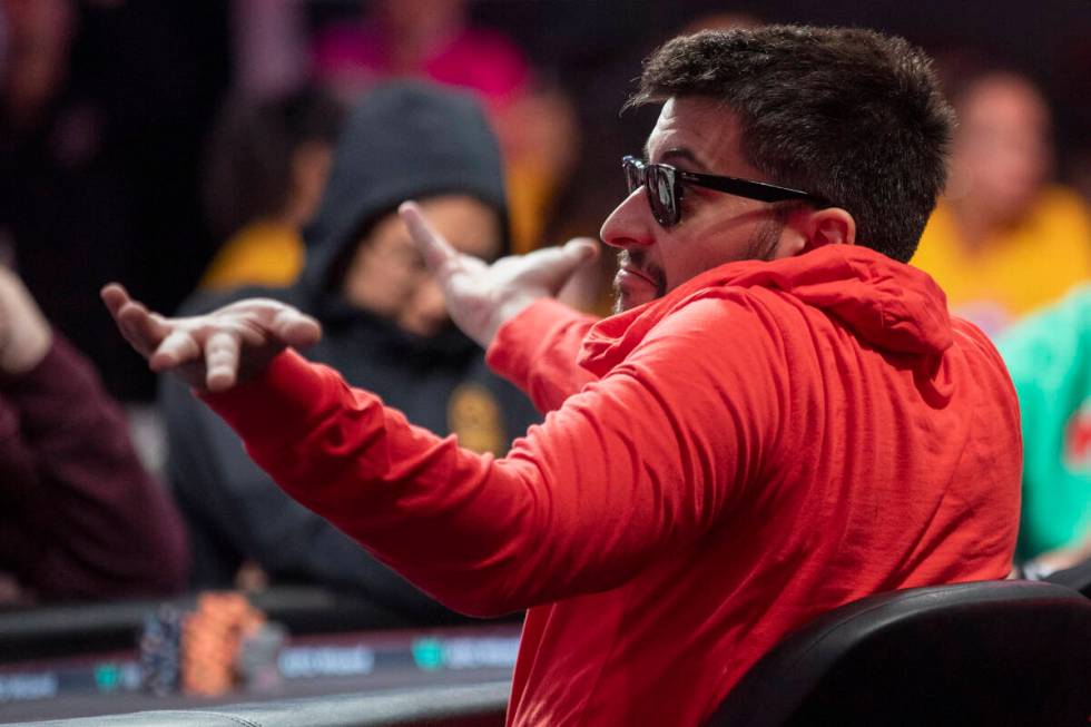 Boris Angelov shrugs to family and friends while competing in the final table of the World Seri ...