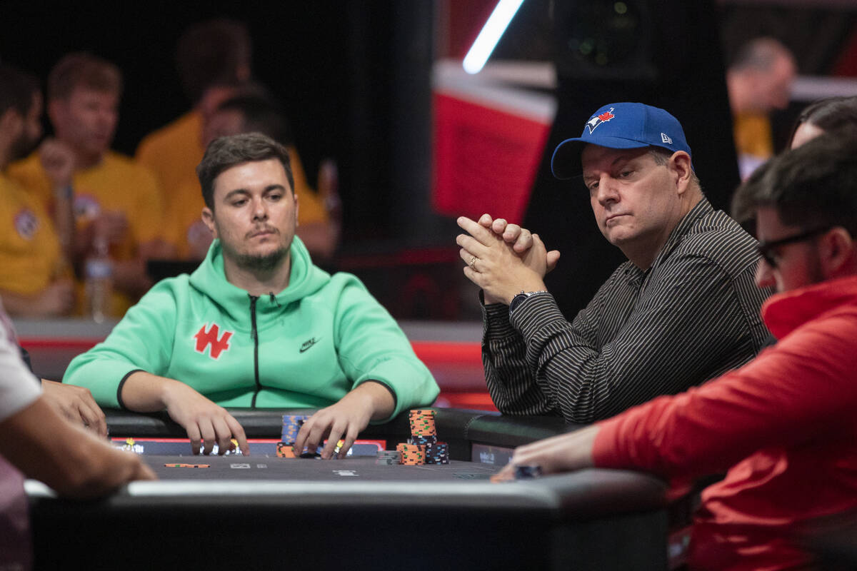 Andres Gonzalez, left, and Jason Sagle, right, compete in the final table of the World Series o ...