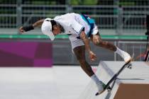 Nyjah Huston of the United States competes in men's street skateboarding at the 2020 Summer Oly ...