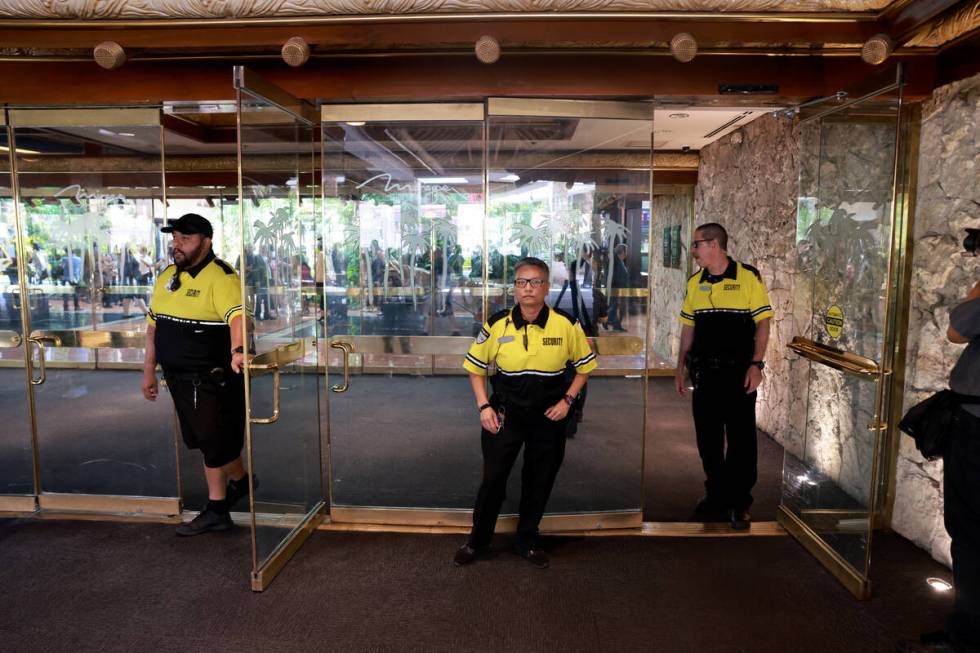 The Mirage security team members close the doors to the public for the final time at the Strip ...