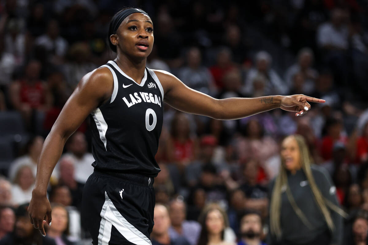 Las Vegas Aces guard Jackie Young (0) gestures to a referee during the first half of a WNBA bas ...