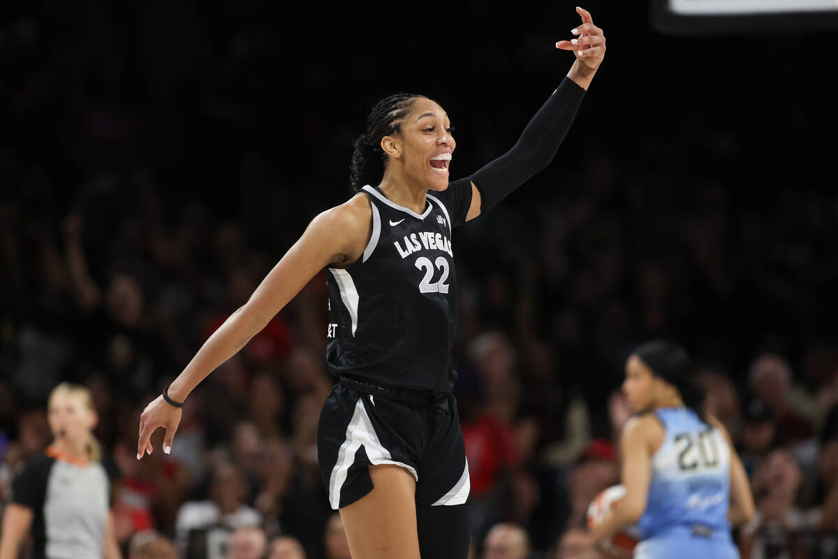 Las Vegas Aces center A'ja Wilson (22) celebrates after scoring during the second half of a WNB ...