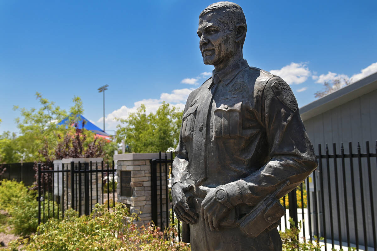 A statue of officer Alyn Beck is seen at the entrance to Officer Alyn Beck Memorial Park in Las ...