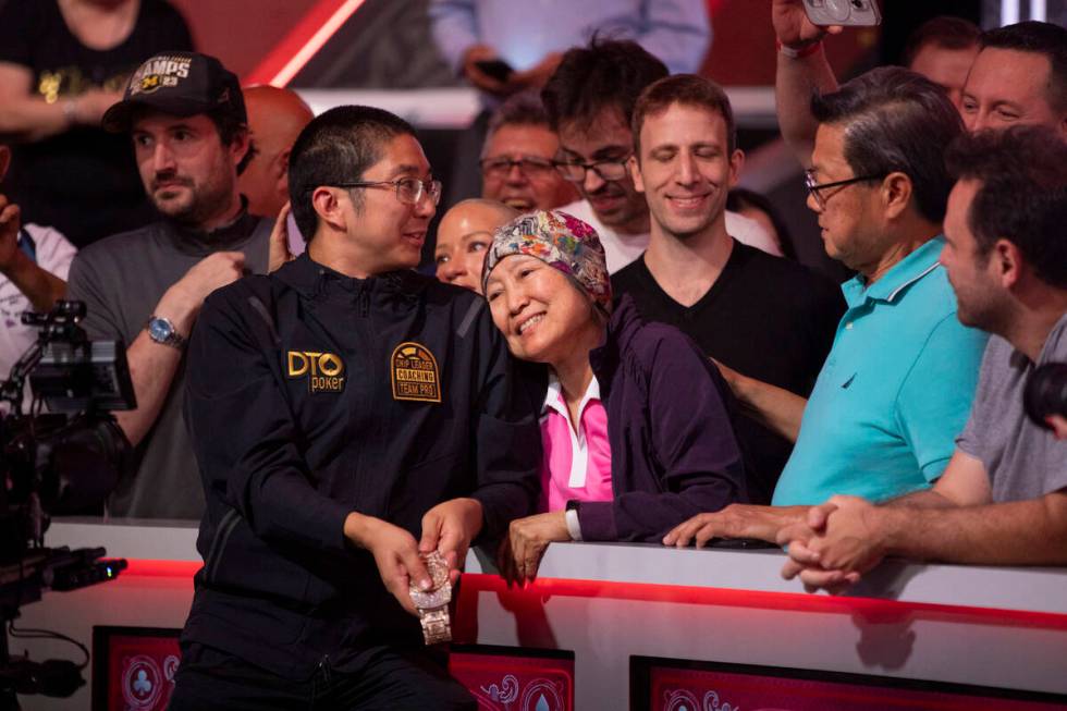 Jonathan Tamayo, left, is greeted by his family after winning the World Series of Poker Main Ev ...