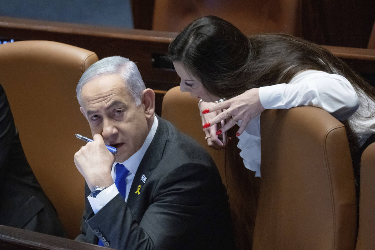 Israel's Prime Minister Benjamin Netanyahu attends a session of the Knesset, Israel's parliamen ...