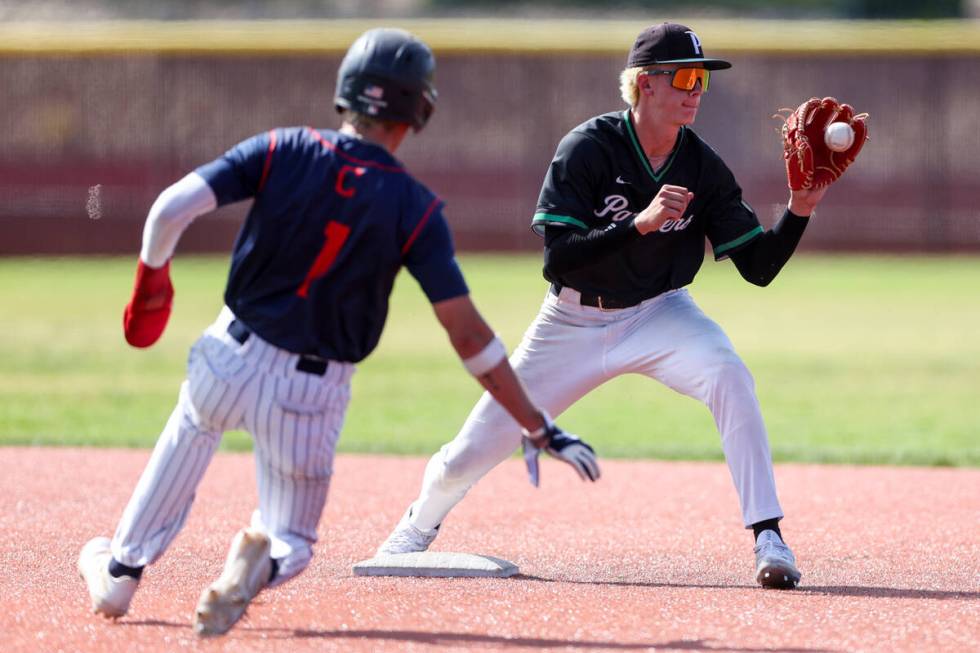 Palo Verde infielder Ethan Clauss (25) catches for an out on Coronado outfielder Evan Festa (1) ...