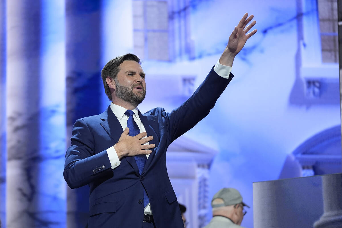 Republican vice presidential candidate Sen. JD Vance, R-Ohio, waves after speaking on third day ...