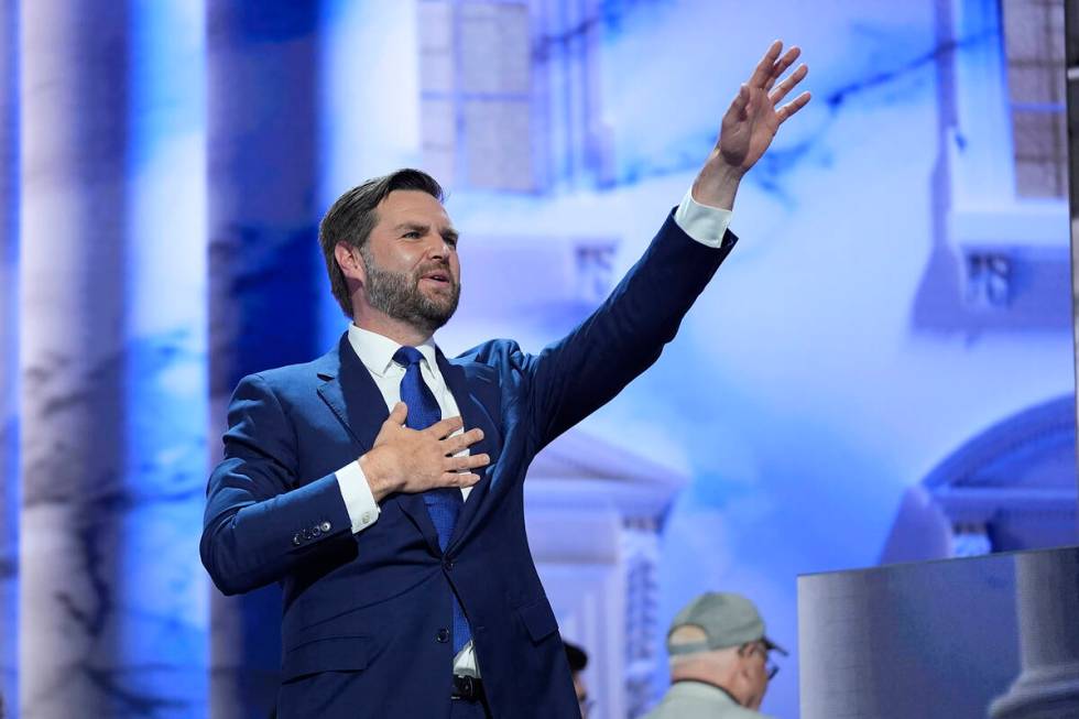 Republican vice presidential candidate Sen. JD Vance, R-Ohio, waves after speaking on third day ...