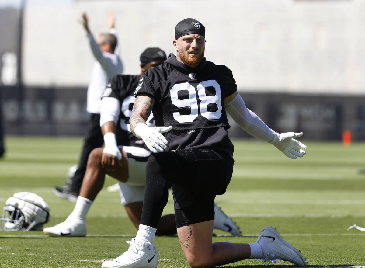 Raiders defensive end Maxx Crosby (98) stretches during team's practice at the Intermountain He ...
