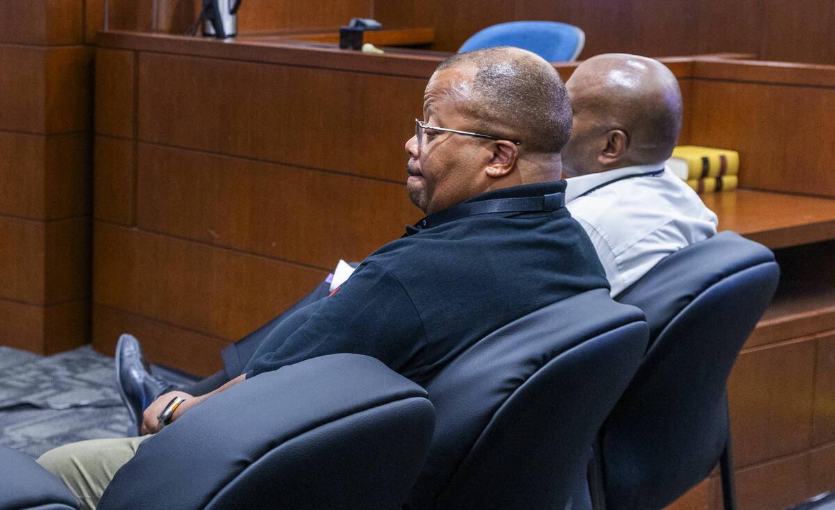 Security guard Wesley Todd Arrington sits and listens after talking about getting shot by Jessi ...