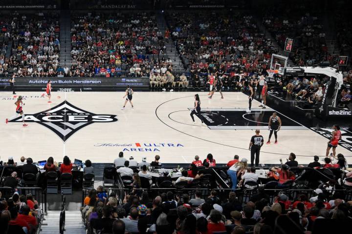 The Las Vegas Aces take on the Washington Mystics during the first half of their WNBA game Thur ...