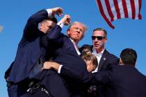 Republican presidential candidate former President Donald Trump is surround by U.S. Secret Serv ...