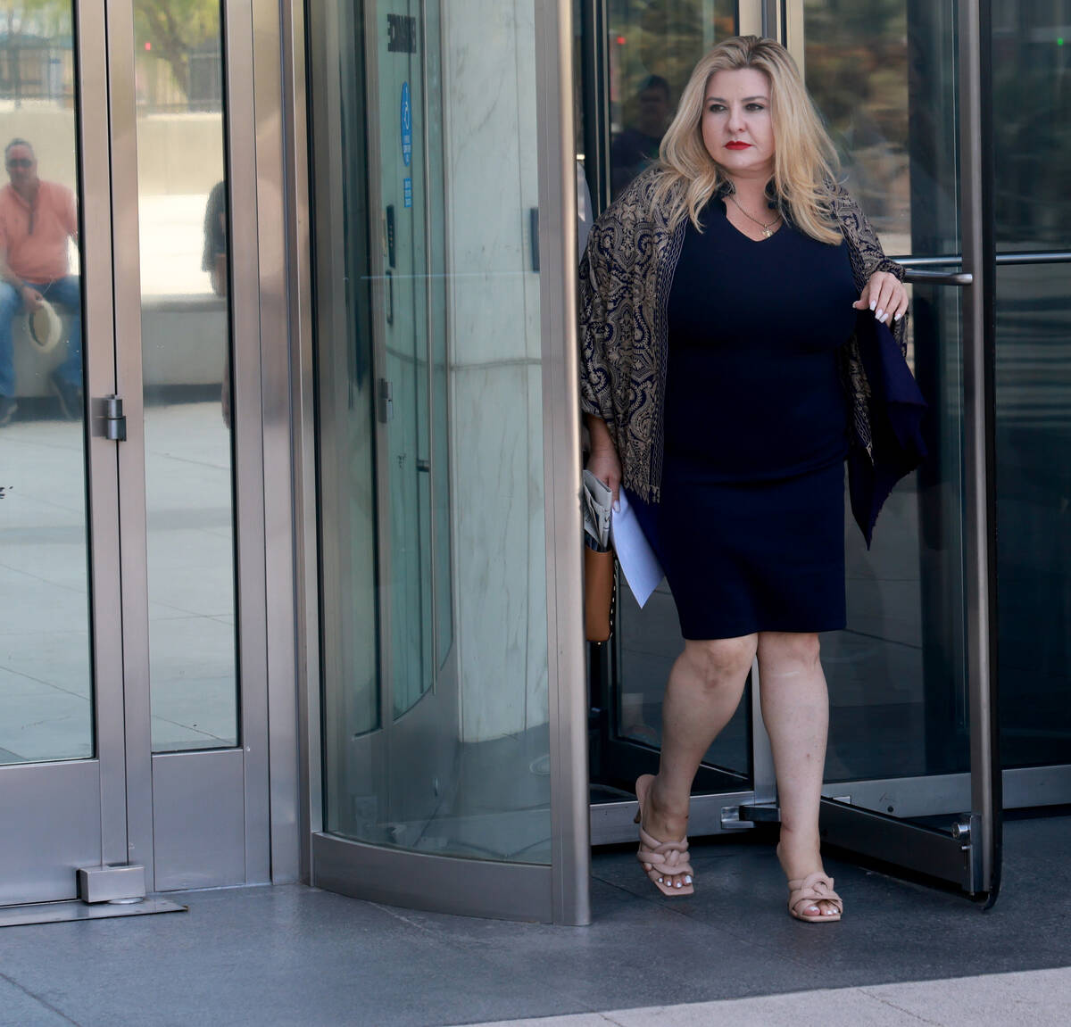 Former Las Vegas City Councilwoman Michele Fiore walks out of the Lloyd George U.S. Courthouse ...