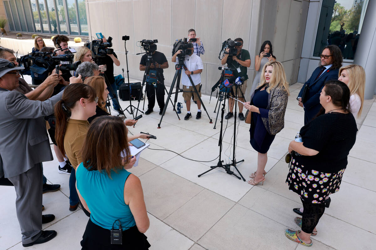 Former Las Vegas City Councilwoman Michele Fiore reads a statement to the news media outside th ...