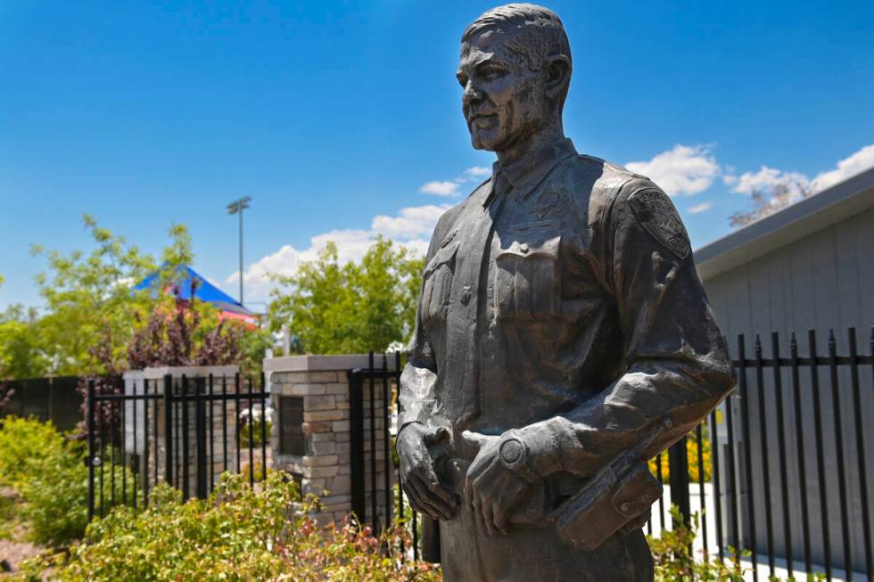 A statue of Officer Alyn Beck is seen at the entrance to Officer Alyn Beck Memorial Park in Las ...
