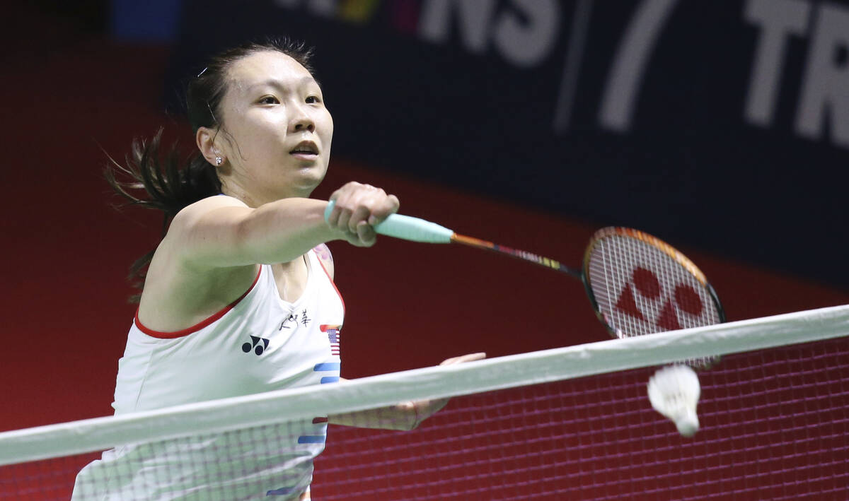United States' Beiwen Zhang returns a shot to China's He Bing Jiao in their women's singles mat ...