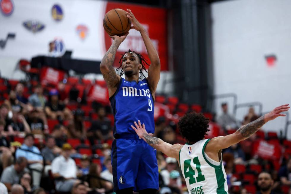 Dallas Mavericks forward AJ Lawson (9) shoots against Boston Celtics guard Jaelen House (41) du ...