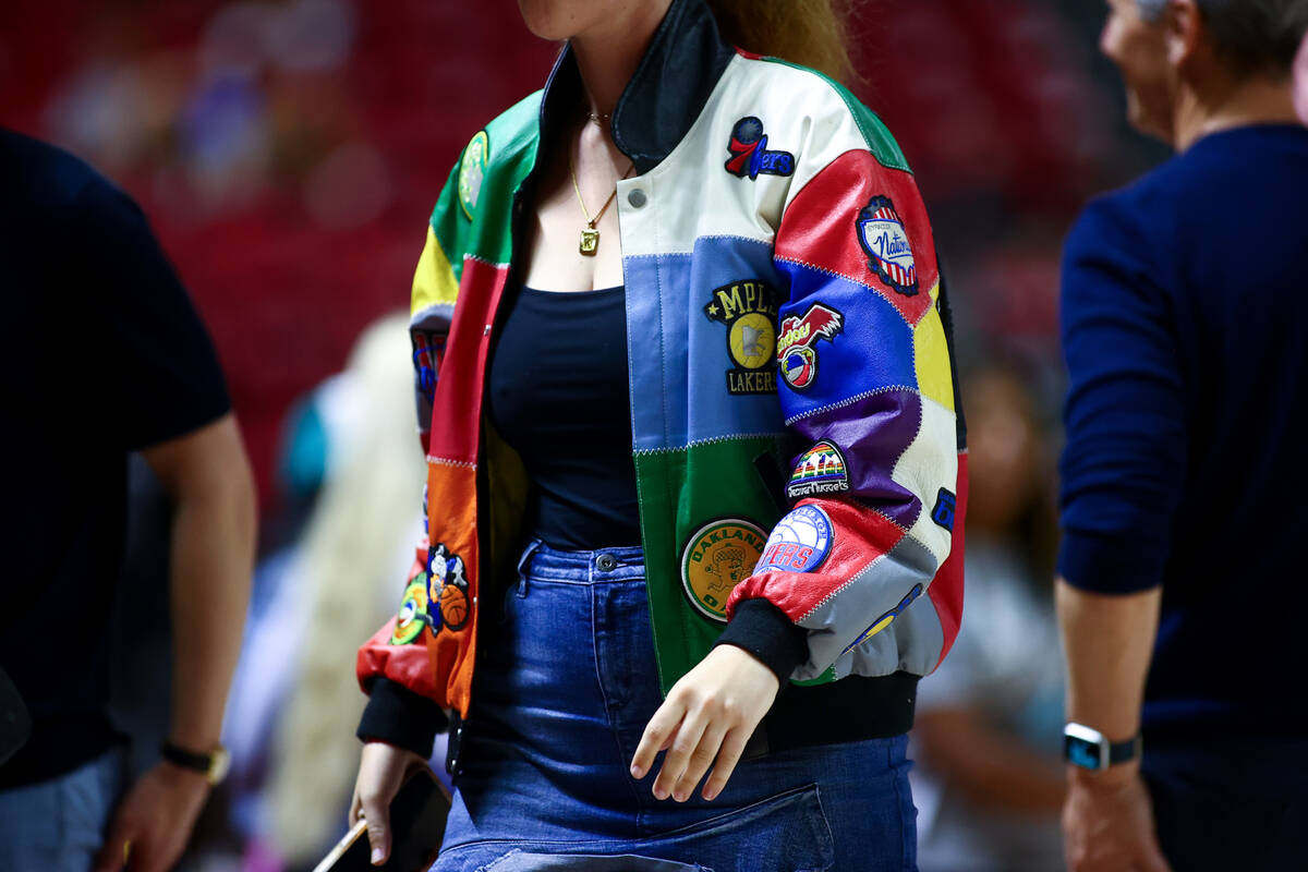 A fan wears a custom leather jacket during an NBA summer league basketball game between the San ...