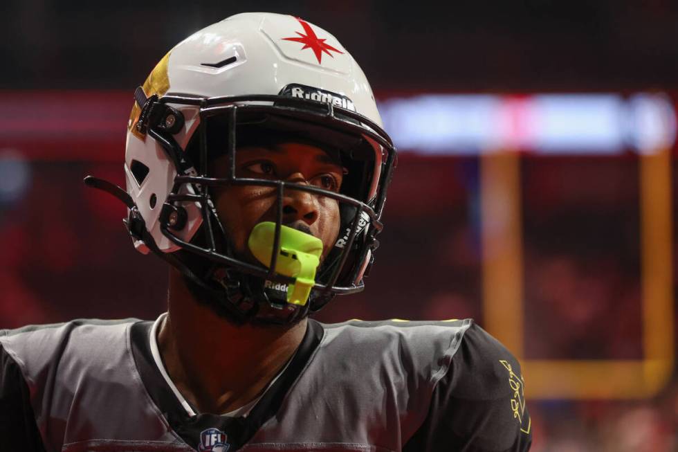 Vegas Knight Hawks wide receiver Jonathan Johnson positions himself to start a play during the ...