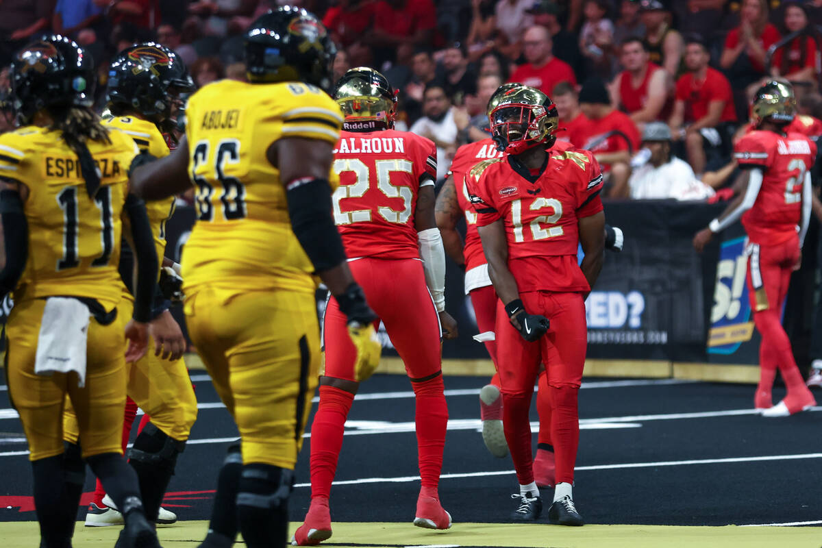 The Vegas Knight Hawks celebrate during an IFL (Indoor Football League) game against the Tucson ...