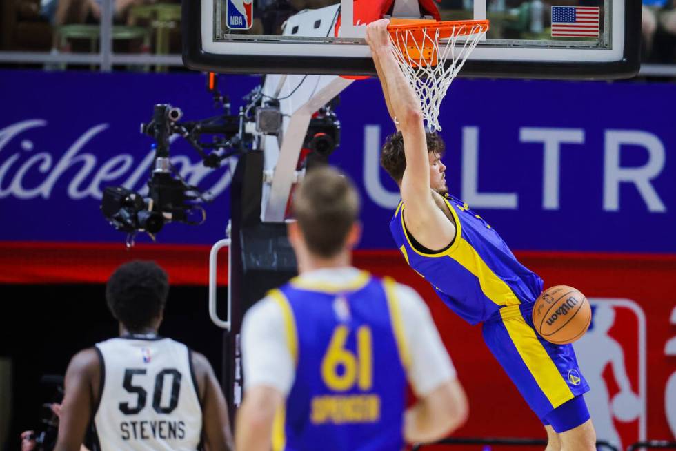 Golden State Warriors center Quinten Post (21) dunks the ball during an NBA Summer League baske ...