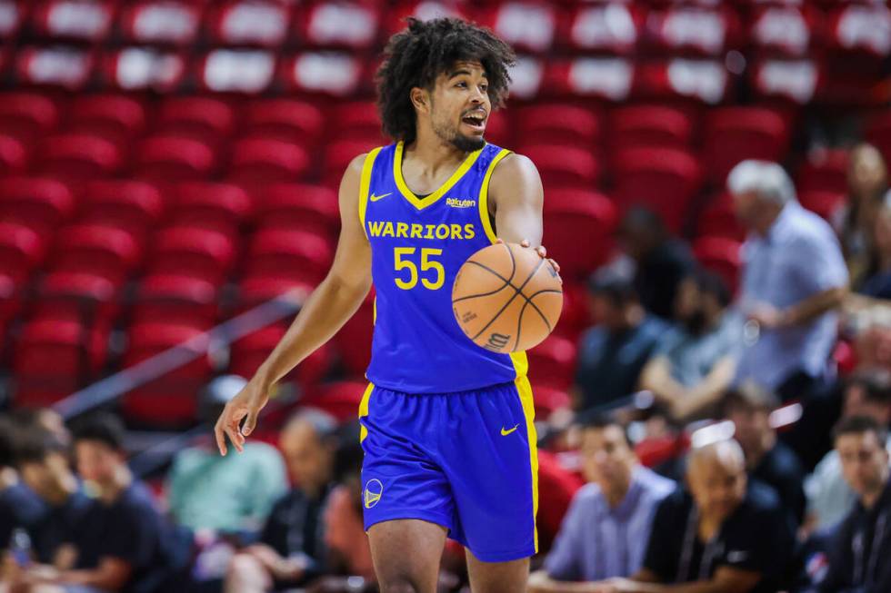 Golden State forward/guard Ethan Thompson (55) dribbles the ball during an NBA Summer League ba ...