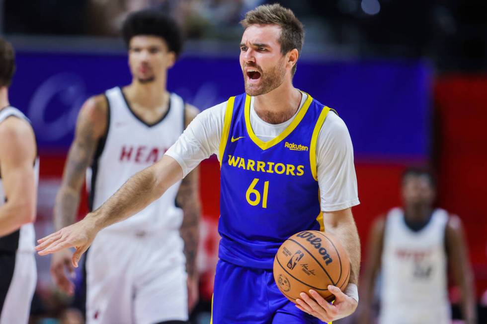 Golden State Warriors guard Pat Spencer (61) reacts to a referee calling a foul during an NBA S ...