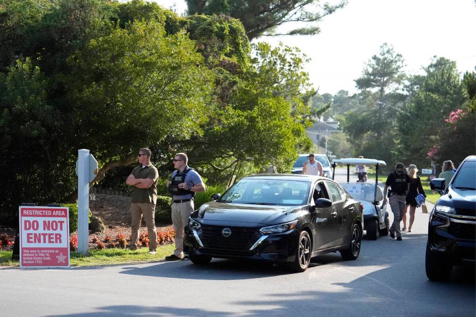 Law enforcement blocks off a street near President Joe Biden's beach house, Sunday, July 21, 20 ...